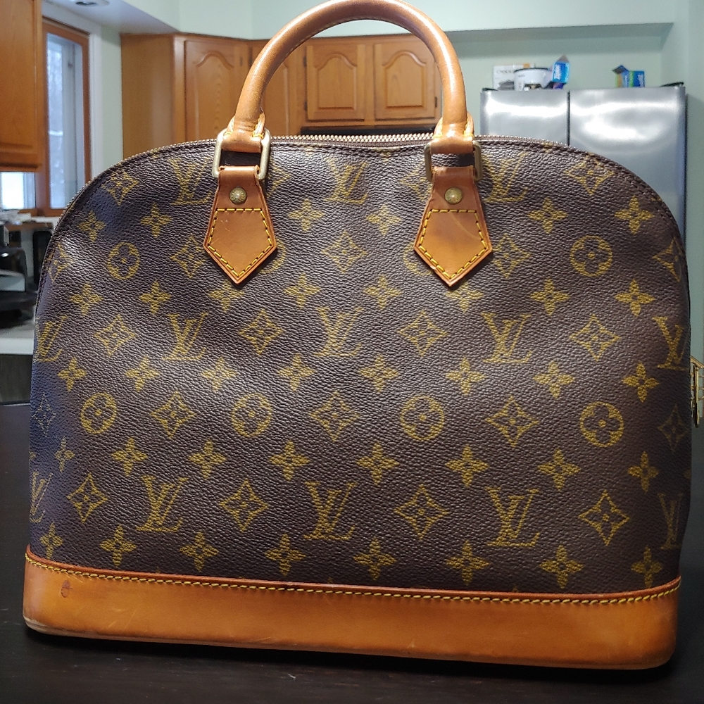 Louis Vuitton Alma PM handbag